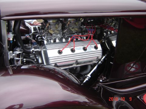 1993 Ford Bronco - Custom V8 engine with chrome valve covers and dual carburetors, likely from a hot rod or classic car.