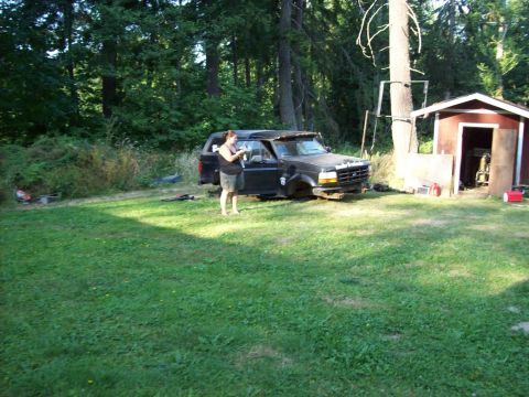1995 Ford Bronco - This 1995 Ford Bronco is missing its front wheels and appears to be undergoing some work.