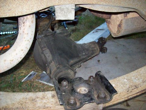 1995 Ford Bronco - Close-up view of a steering gearbox and suspension components, likely from a truck or SUV.