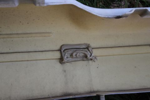 2003 Ford Crown Victoria - used a light bonding tape on the front and then used a strong adhesive to seal the hole off from the back, later i will fill in the front b…
