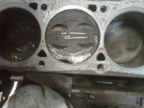 1994 Ford F-150 - Engine cylinders and pistons are shown in this close-up view.