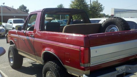 1988 Ford Bronco - This red Ford Bronco, with its distinctive body style, appears to be from the late 1980s, not 1988.