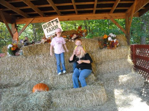 1979 Ford F-150 - A family poses for a photo at Burt's Farm during the fall season.