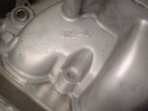 1965 Ford 427 - Close-up of a metal casting stamped with '425-L'.