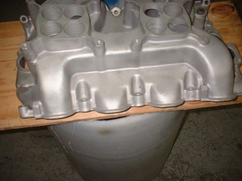 1965 Ford 427 - Close-up of an aluminum intake manifold, showing its ports and casting details.