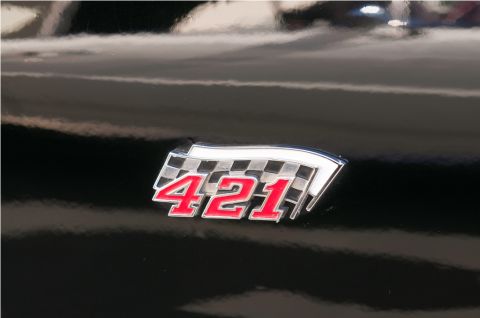 2006 Cadillac STS - Close-up of a 421 emblem on a black vehicle, indicating a specific engine or trim level.
