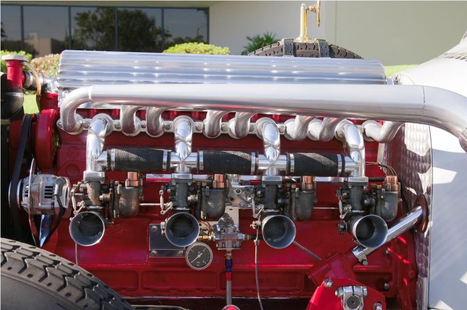 Engine with polished intake manifold and four carburetors