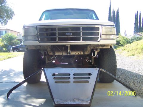 1995 Ford Bronco - Front view of a lifted 1995 Ford Bronco with a custom metal bumper.