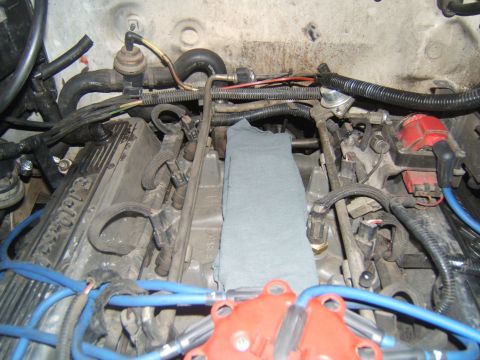 1988 Ford Bronco - Close-up view of an engine bay with various components and wiring visible.