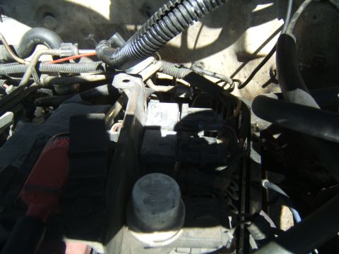 1988 Ford Bronco - Engine bay components including fuse box and wiring are visible in this close-up shot.