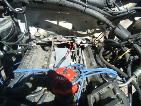 1988 Ford Bronco - Close-up view of an engine bay, showing various components and wiring.