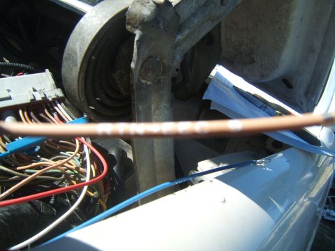 1988 Ford Bronco - Engine bay wiring and components are visible, including a labeled copper wire.