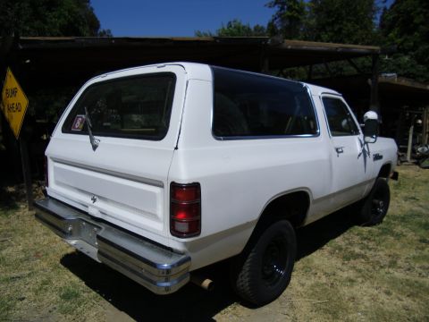 1987 Dodge 1500 - This white SUV's body style suggests it is from the 1980s, not a 1987 model.