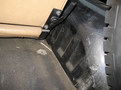 1987 Dodge 1500 - Close-up of the interior floor and seat mounting hardware.