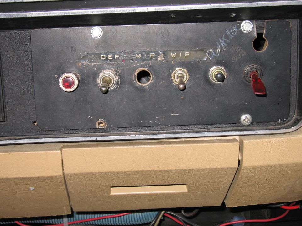 Dashboard panel with DEF, MIR, and WIP labels above toggle switches and a red toggle switch