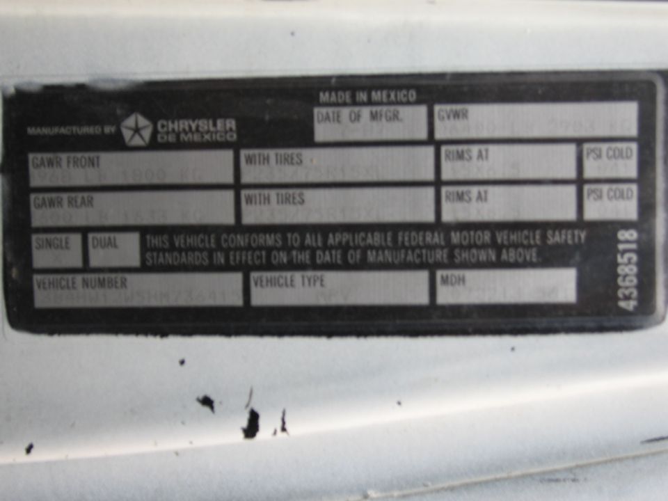 Close-up of a Chrysler de Mexico VIN plate with manufacturing details