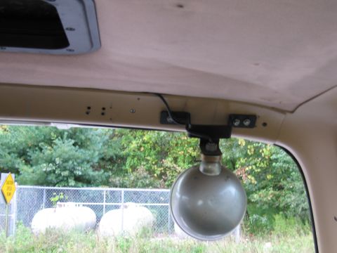 1987 Dodge 1500 - An interior light fixture is visible, mounted to the headliner of the vehicle.