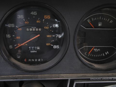 1987 Dodge 1500 - The dashboard shows a 1987 Dodge 1500's odometer reading, fuel level, and oil pressure.