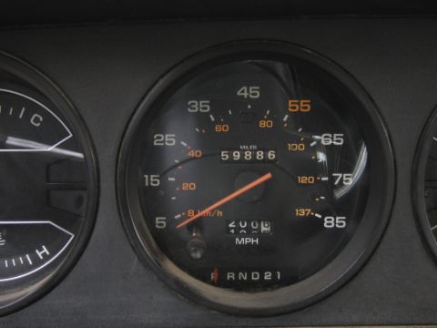 1987 Dodge 1500 - The odometer reads 59,886 miles on this vehicle's dashboard gauges.