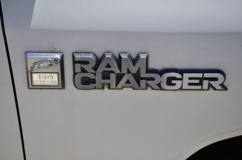 1987 Dodge 1500 - Close-up of a Ramcharger emblem, indicating a specific trim level.