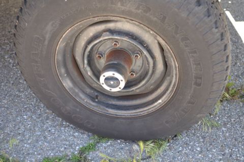1987 Dodge 1500 - Close-up of a vehicle's wheel and tire, with visible tire brand and model information.