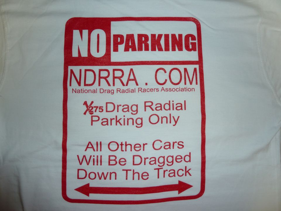 White t-shirt with red graphic: NO PARKING NDRRA.COM National Drag Radial Racers Association 275 Drag Radial Parking Only All Other Cars Will Be Dragged Down The Track