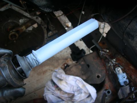 1984 Ford Bronco - A steering column shaft, possibly being prepped for installation or repair, is shown in detail.