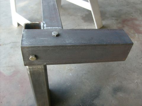1986 Ford Bronco - Close-up view of a metal frame section, showing bolted connections.
