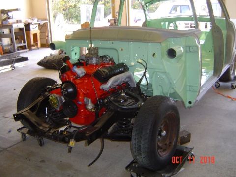 1956 Ford Fairlane - Project car body and engine assembly in a garage, dated Oct 4, 2010.