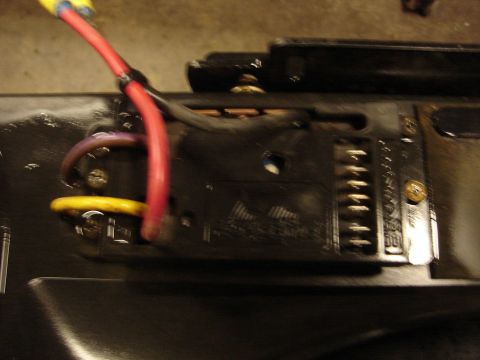 1989 Ford Bronco - A close-up view of an electrical component with several wires connected to it.