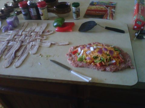 1986 Ford Bronco - Preparing a meatloaf with a side of woven bacon strips on a cutting board.