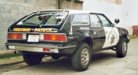 1991 Ford Crown Victoria - This AMC Eagle wagon is marked as Highway Patrol, a distinctive rear design and police livery.
