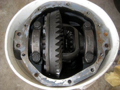 1996 Ford Bronco - This image shows the internal components of a vehicle's differential, including the ring gear and spider gears.