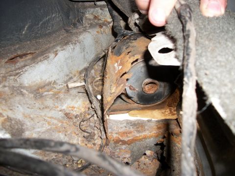 1992 Jeep Cherokee - Significant rust damage is visible on the vehicle's undercarriage, affecting structural integrity.