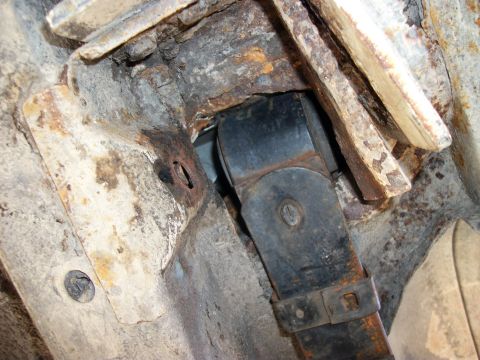 1992 Jeep Cherokee - Detail shot of heavily rusted chassis components, likely from an older vehicle.