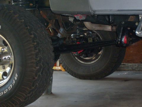 1986 Ford Bronco - Close-up view of the rear axle and suspension of a 1986 Ford Bronco, BFGoodrich tires.