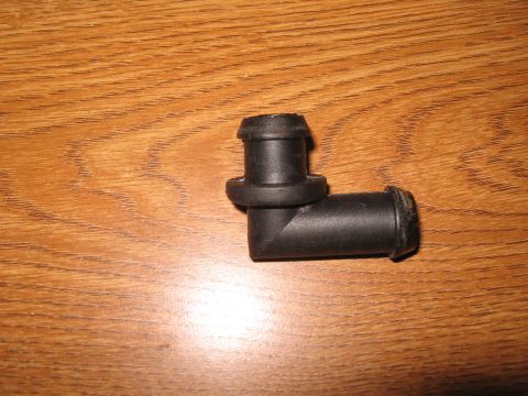 1994 Ford Bronco - This is a black rubber spark plug wire boot with a 90-degree bend.
