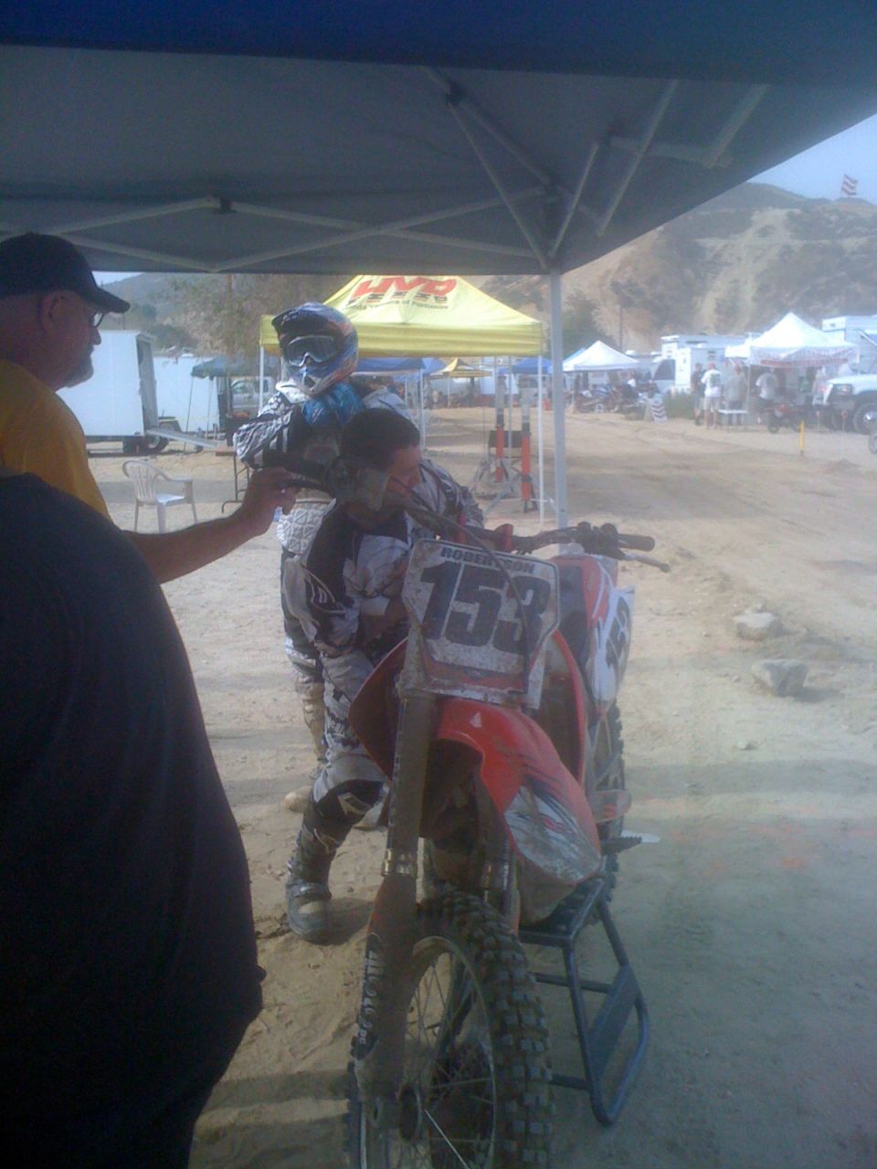 Motocross motorcycle with number 153 on front plate