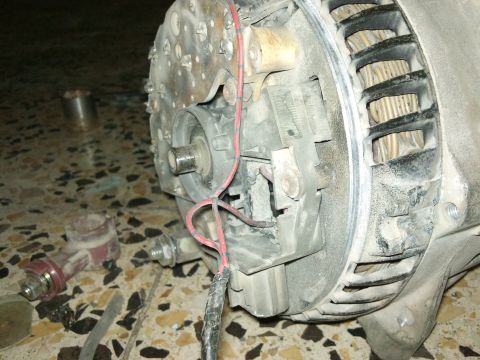 1998 Ford Crown Victoria - This photo shows a disassembled automotive alternator, not a 1998 Ford Crown Victoria.