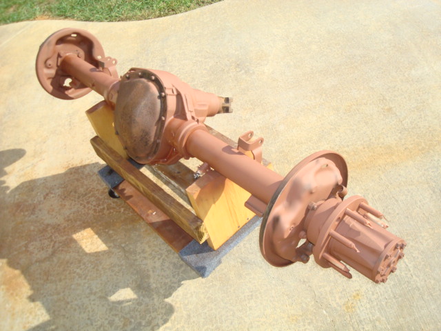 Rear axle assembly on wooden blocks outside