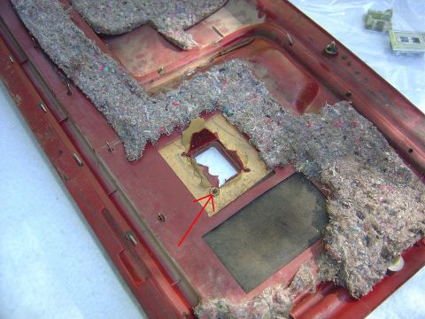 1986 Ford Bronco - Remove the 4 nuts that hold on the trim around the power window switch (Only one shown)
