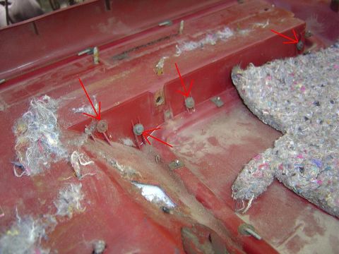1986 Ford Bronco - Remove the 4 screwes that hold the armrest pad on.