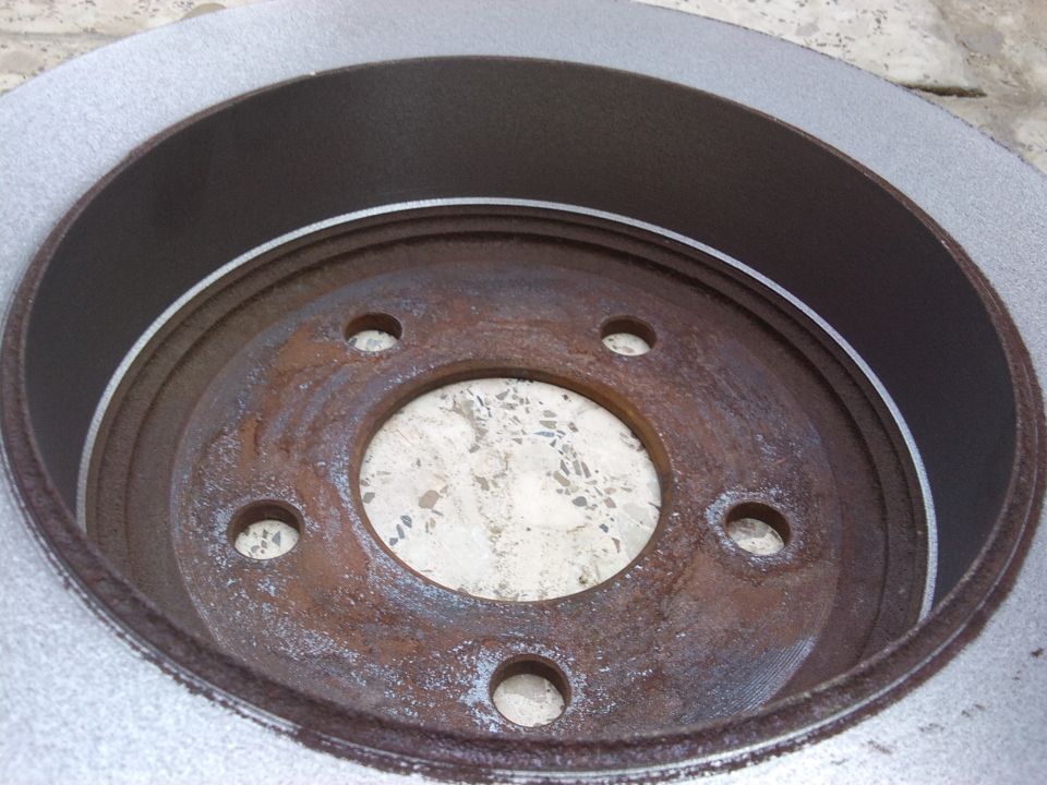 Rusted brake rotor with Supermotors.net watermark