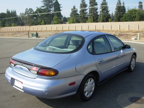1997 Ford Taurus - This 1997 Ford Taurus is shown from the rear three-quarter angle.