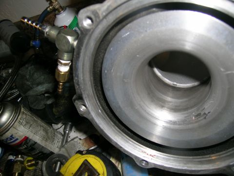 1995 Ford Probe - Turbocharger housing with plumbing fittings, likely for a custom build.
