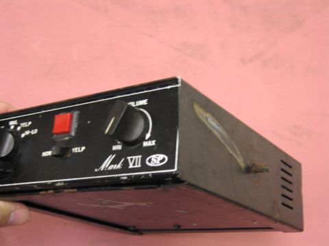 1991 Ford LTD Crown Victoria - A close-up view of a Mark VII control unit, showing its various buttons and dials.