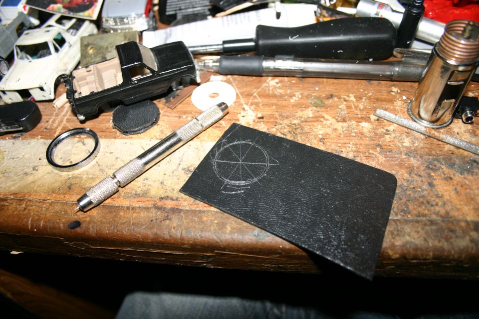 Cutting the black piece out.