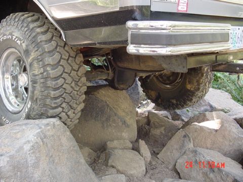 1989 Ford Bronco - This 1989 Ford Bronco navigates a rocky trail, demonstrating its off-road capability.