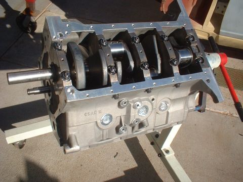 1965 Shelby Cobra - Close-up view of an engine block assembly, highlighting the crankshaft and its bearings.