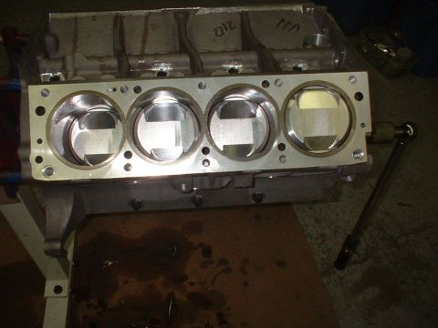 1965 Shelby Cobra - Engine block with pistons installed, showing the cylinder bores and piston tops.